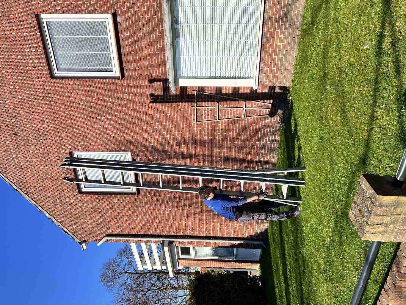 Rijen schoorsteenveger huis ladder